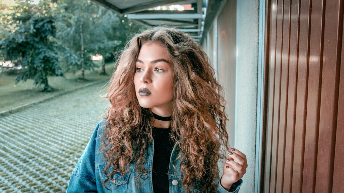 women wearing blue denim jacket