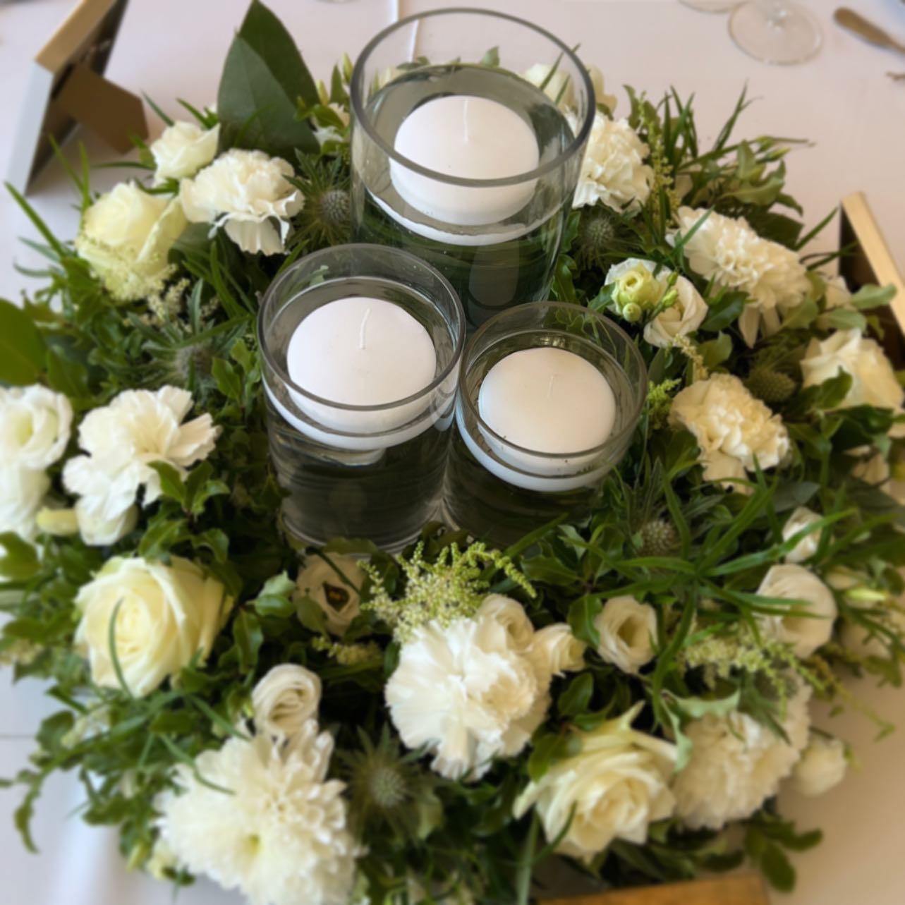 Floating Candles With Floral Wreaths