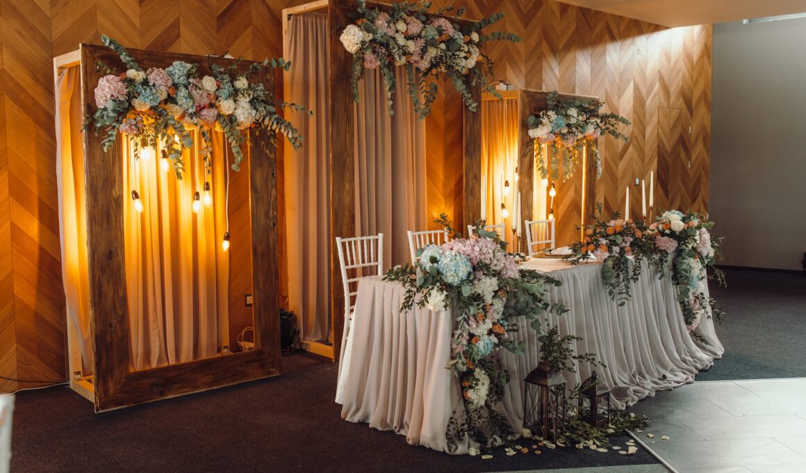 Dreamy Wedding Decor. Lavish floral decorations set against a rustic backdrop