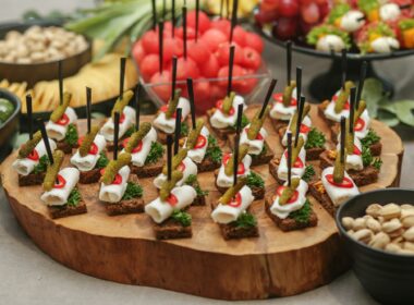 Appetizers made of lard, pickled cucumbers and brown bread stand. Wedding event