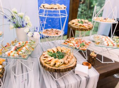 Catering buffet and rustic decor, outdoor wedding party with healthy food snacks