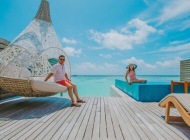 A couple at a luxurious resort in Maldives while on a summer vacation