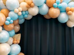 Balloons garland for little baby party on a blue background.