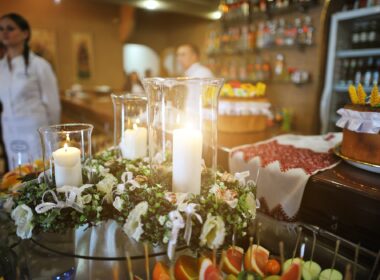 Candles on whreats at wedding reception