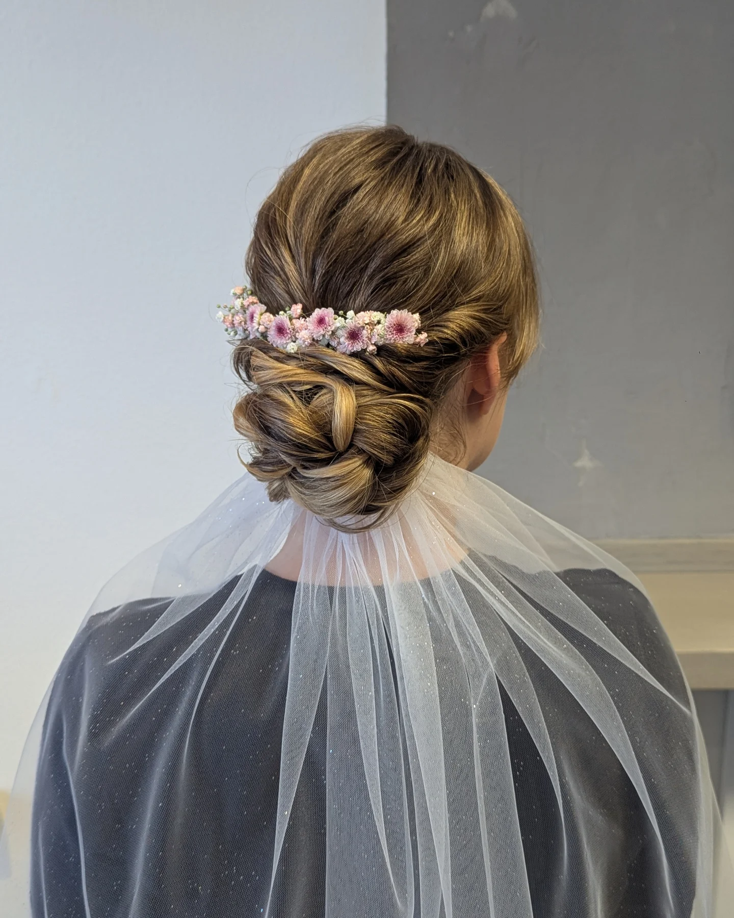 Messy Bun with Flower Sprigs