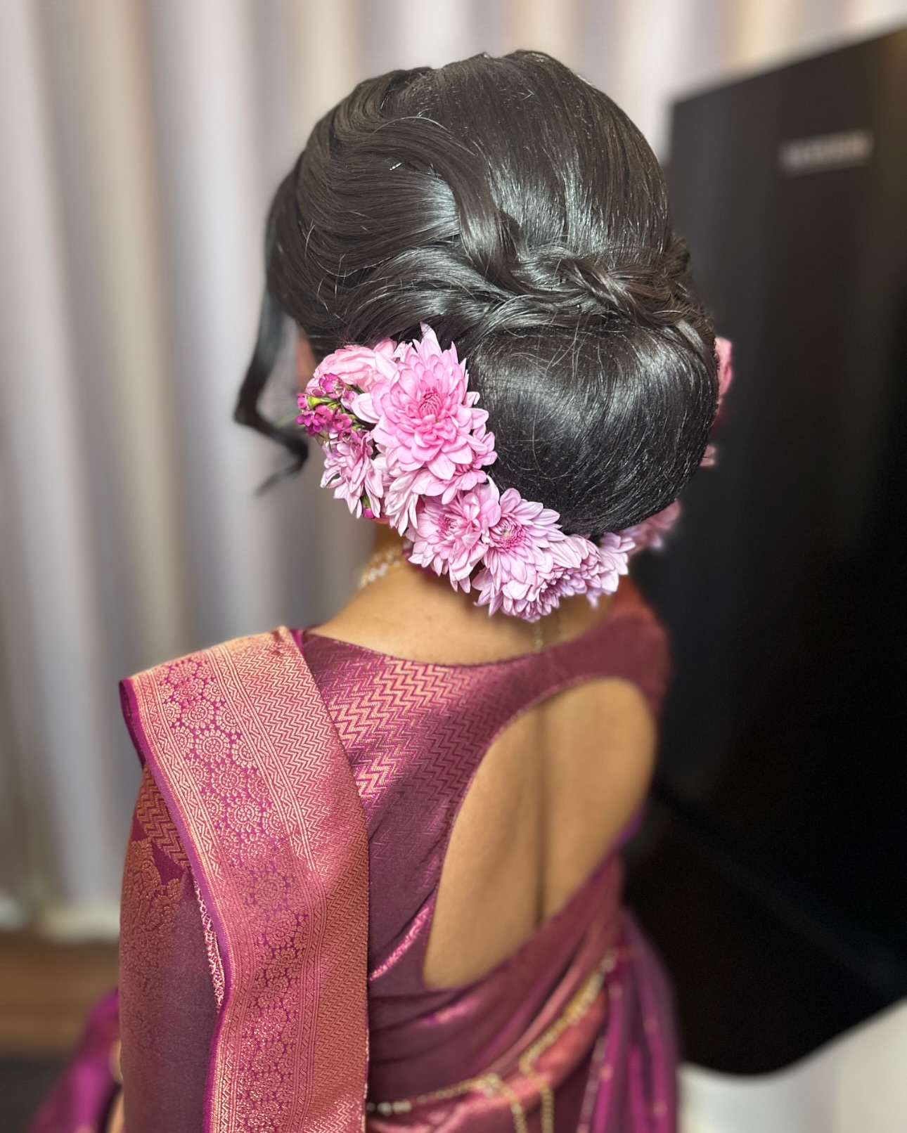 Low Chignon with Lavender Flowers