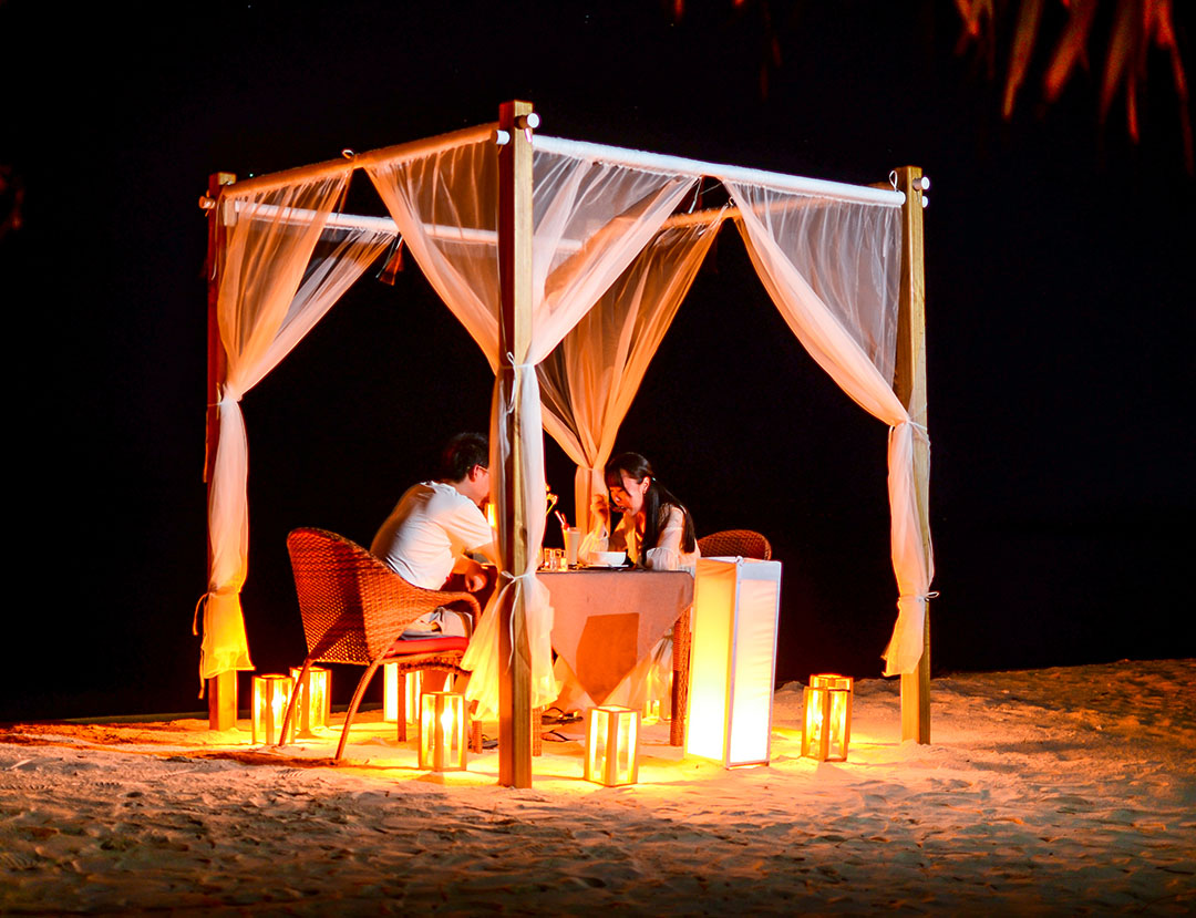Enjoy a Candlelit Beach Dinner