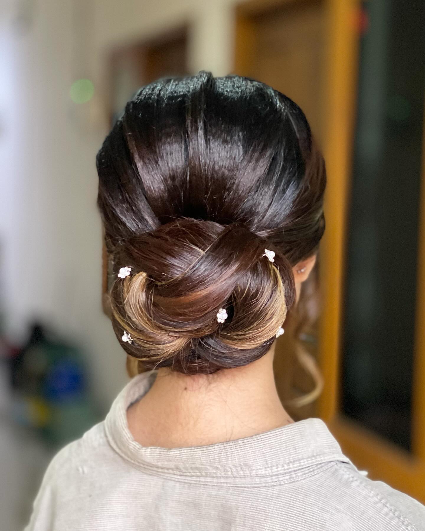 Side Bun with Small Daisy Accents