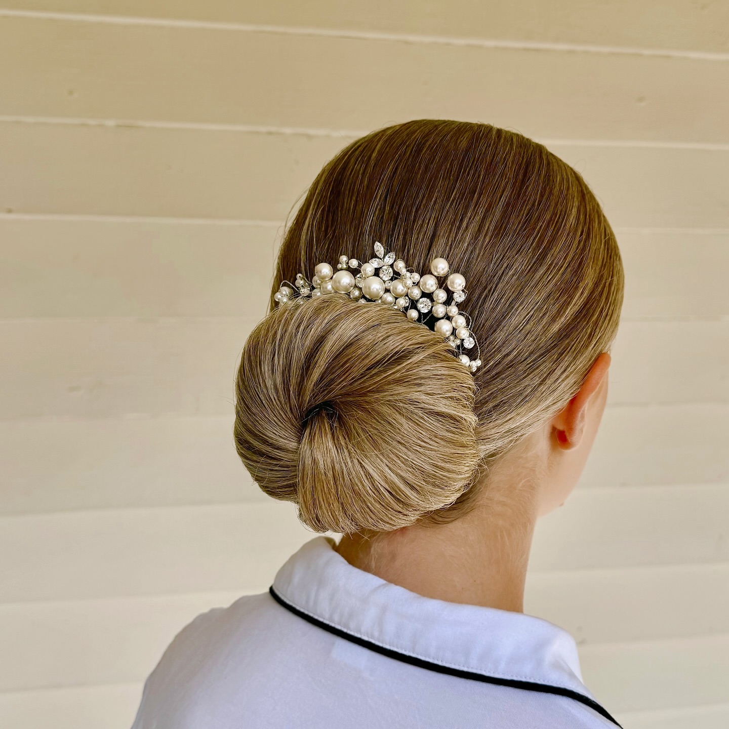 Twisted Low Bun with Tiny Floral Pins