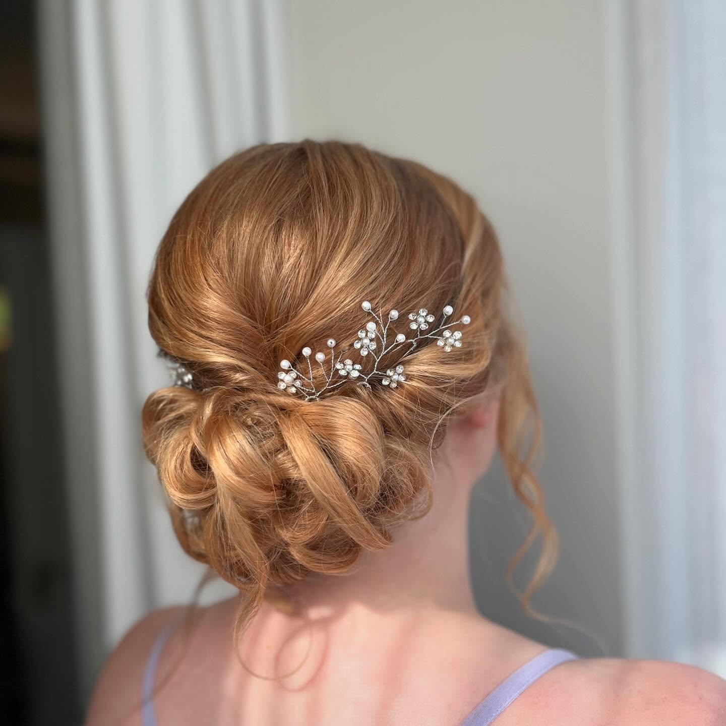 Messy Low Bun with Baby’s Breath