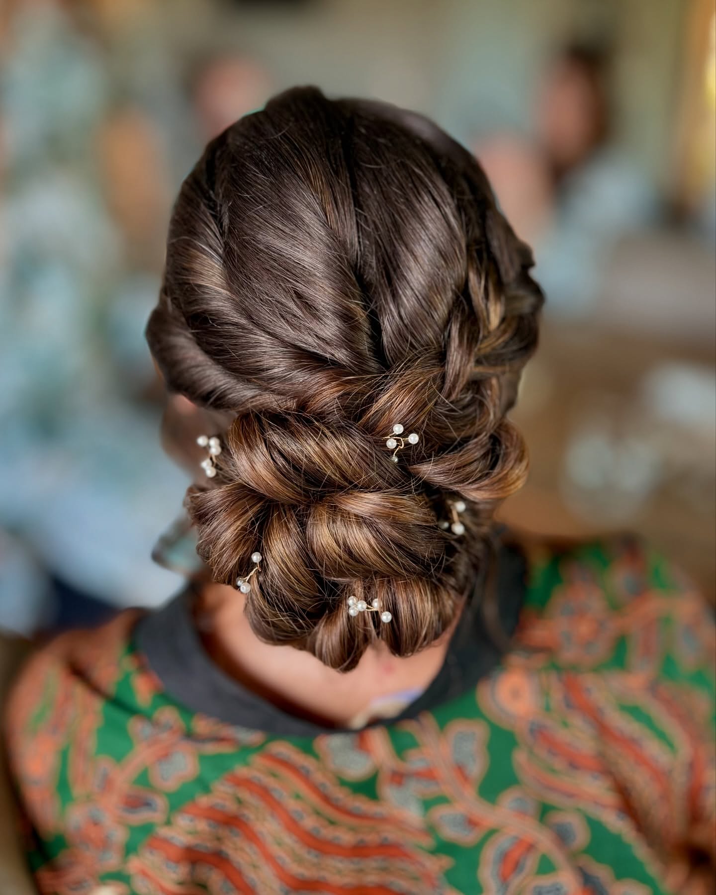 Braided Bun with Scattered Petals