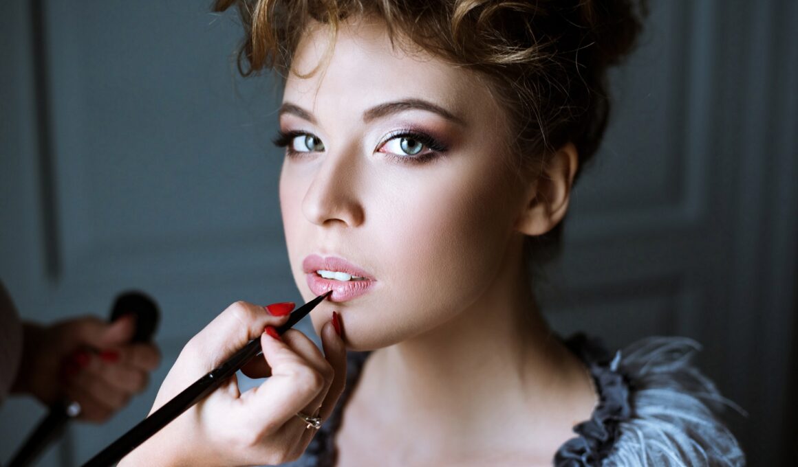 Wedding makeup artist making a make up for bride