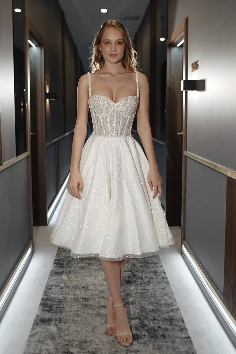 Mini babydoll dress with delicate pearl detailing