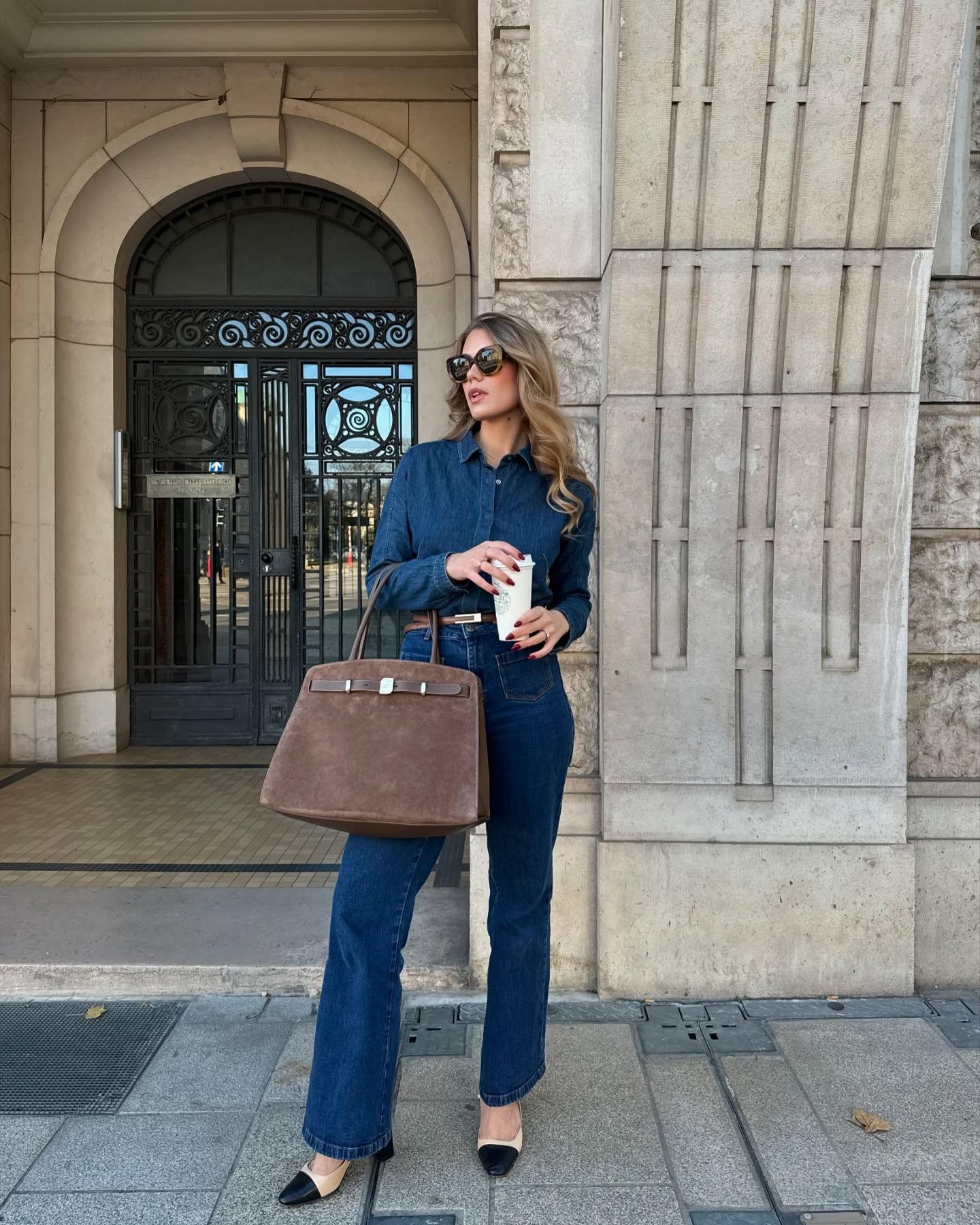 Scandi mom jeans with a denim shirt and pump heels