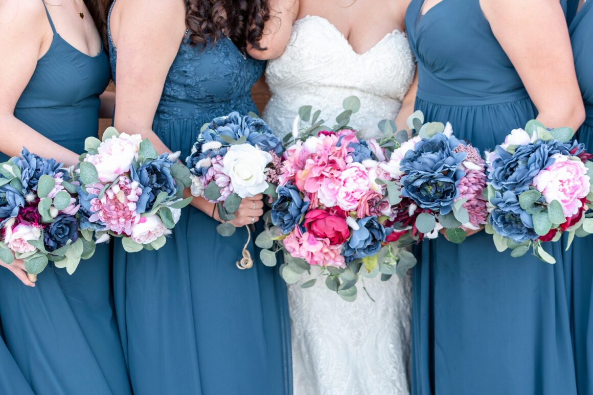 Bride and bridesmaids holding their silk bouquets