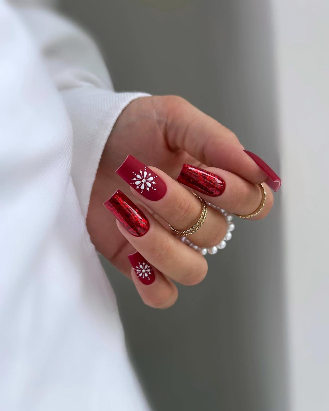 Festive Red and Snowflake Nails