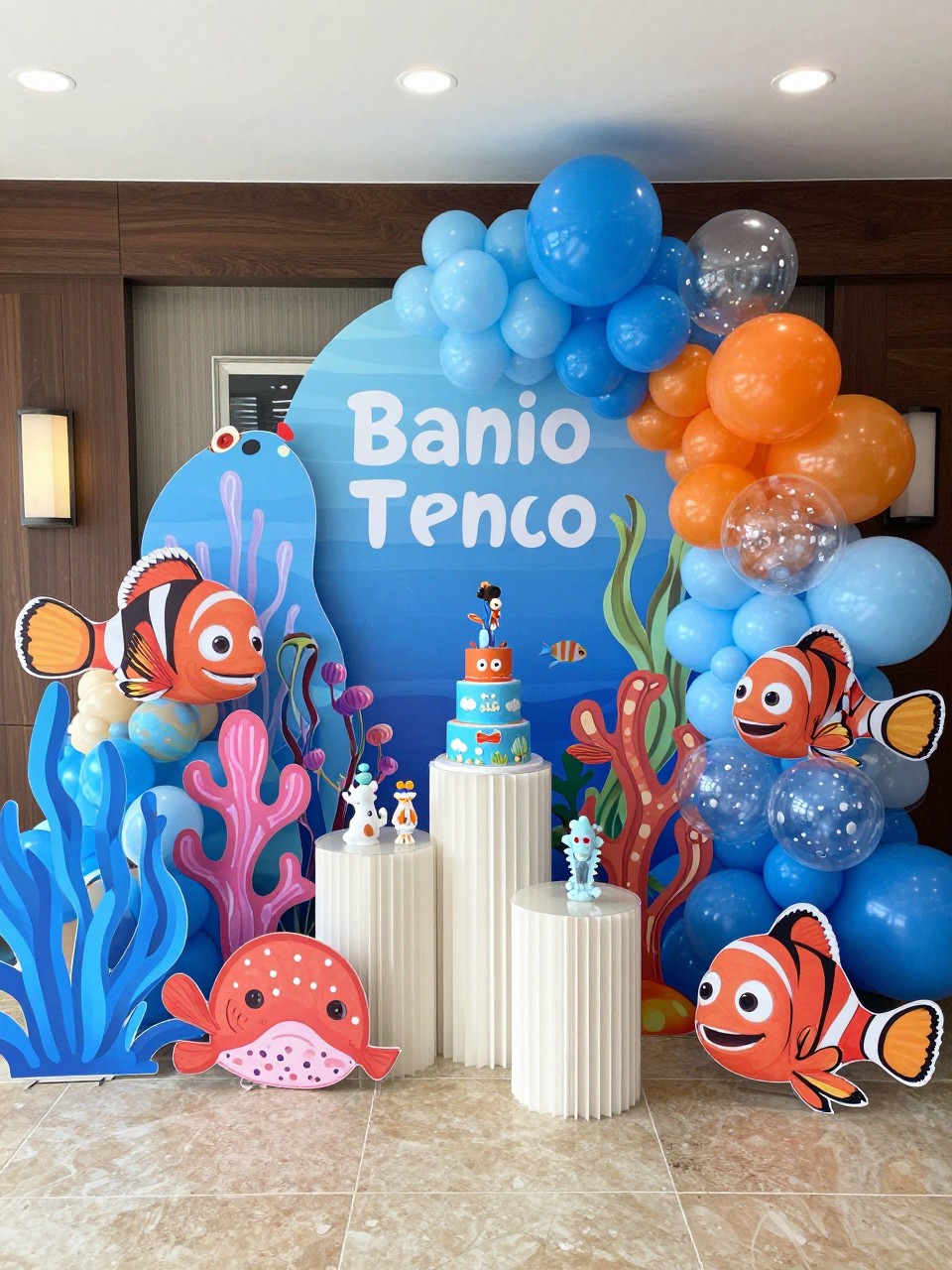 A colorful baby shower setup decorated with underwater and sea creature themes inspired by Finding Nemo.