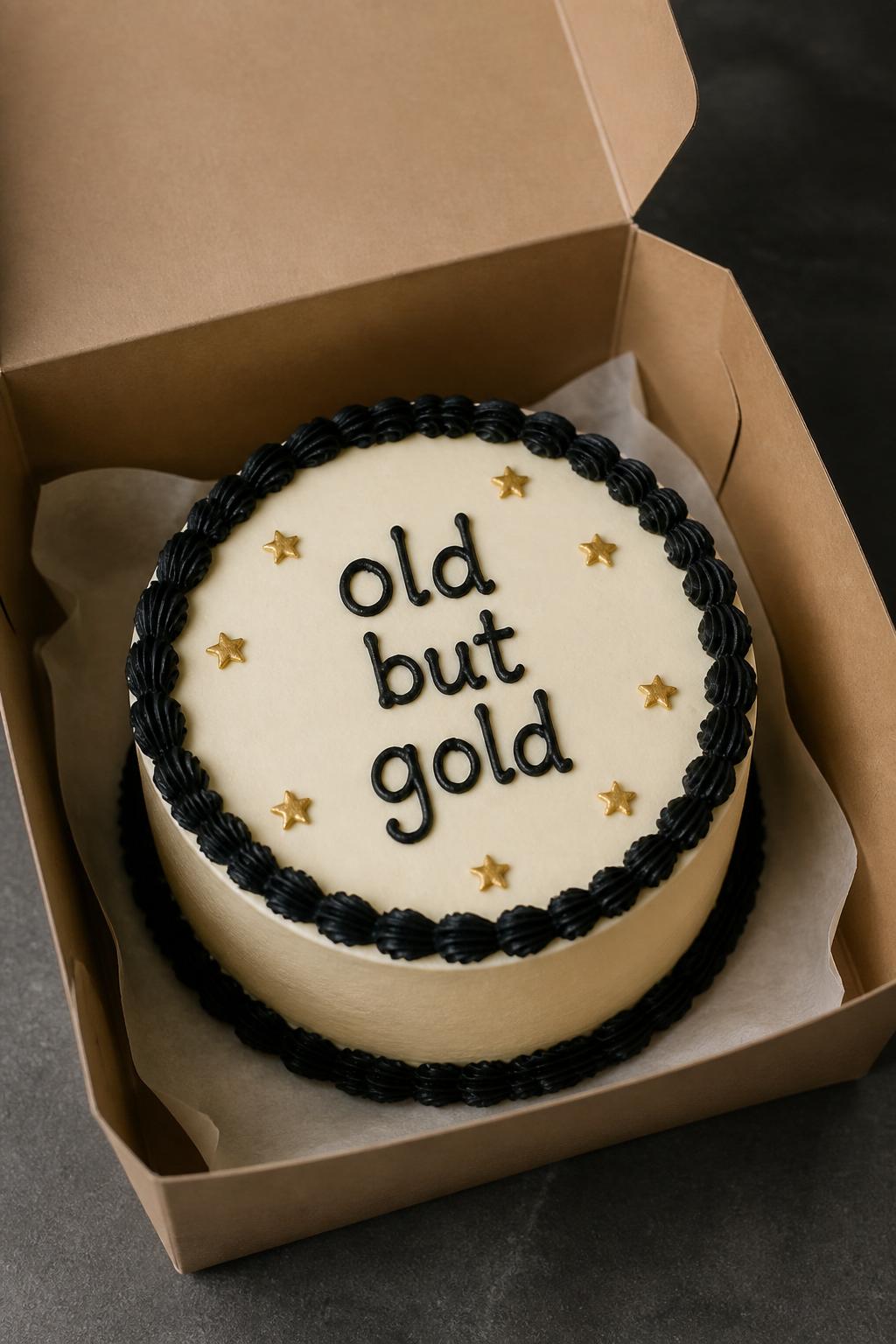 Image Prompt:
A funny bento birthday cake for men inside an open kraft cake box, smooth cream frosting, bold black piped border, handwritten icing text reading “old but gold,” tiny gold star details, playful but clean styling, realistic editorial dessert photography, no people, no hands, no faces, no watermarks on images