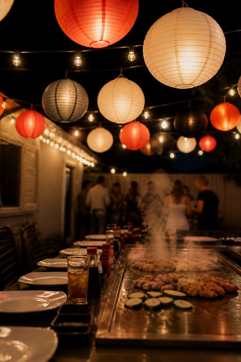 Image Prompt:
A realistic DSLR photo of a hibachi party setup with paper lanterns hanging above the dining table in soft white, warm red, and muted charcoal tones, string lights in the background, a few guests blurred in the distance not facing the camera, cozy evening atmosphere, realistic backyard party photography.