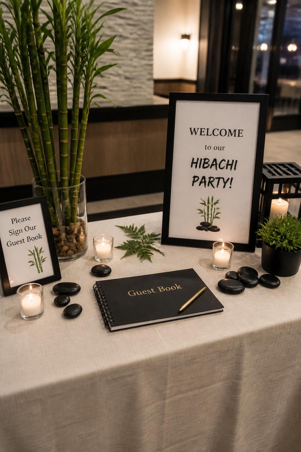 Image Prompt:
A realistic DSLR photo of a hibachi party welcome table styled with bamboo accents, smooth black stones, a guest book, small candles, clean signage, and a neutral linen cloth, no people, elegant party entry styling with soft indoor lighting.